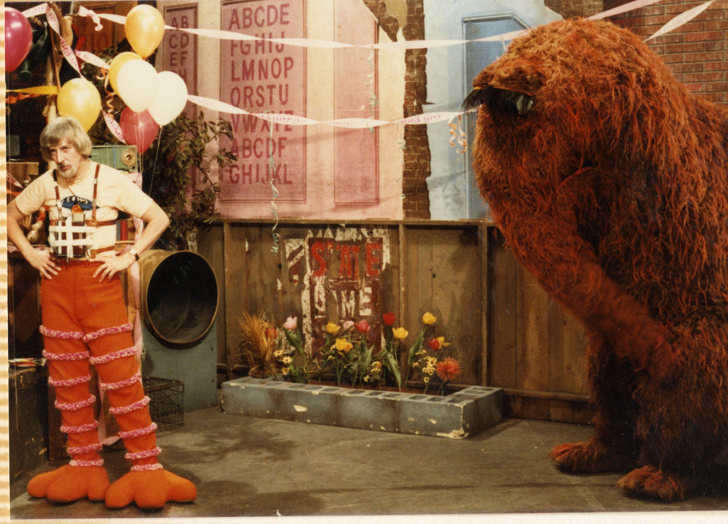   Archival photo of Caroll Spinney and Snuffleupagus on the set of Sesame Street. Photo courtesy of Debra Spinney.  