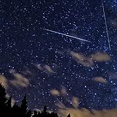 Meteors Under Moonlight