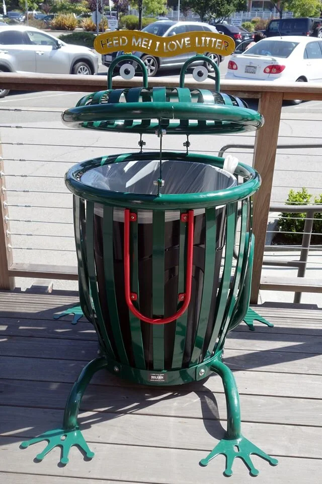 Pick up trash from the sidewalk, park or trail.