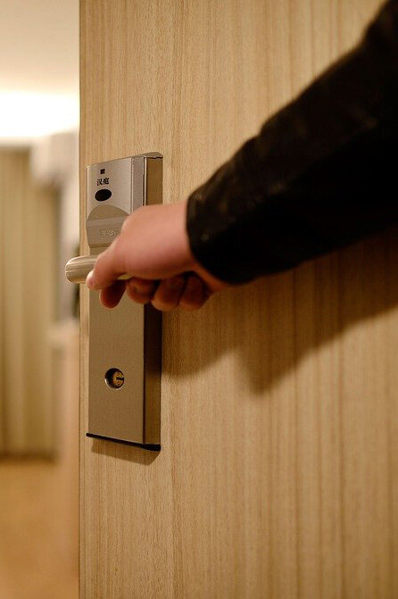 Hold the door open for someone.