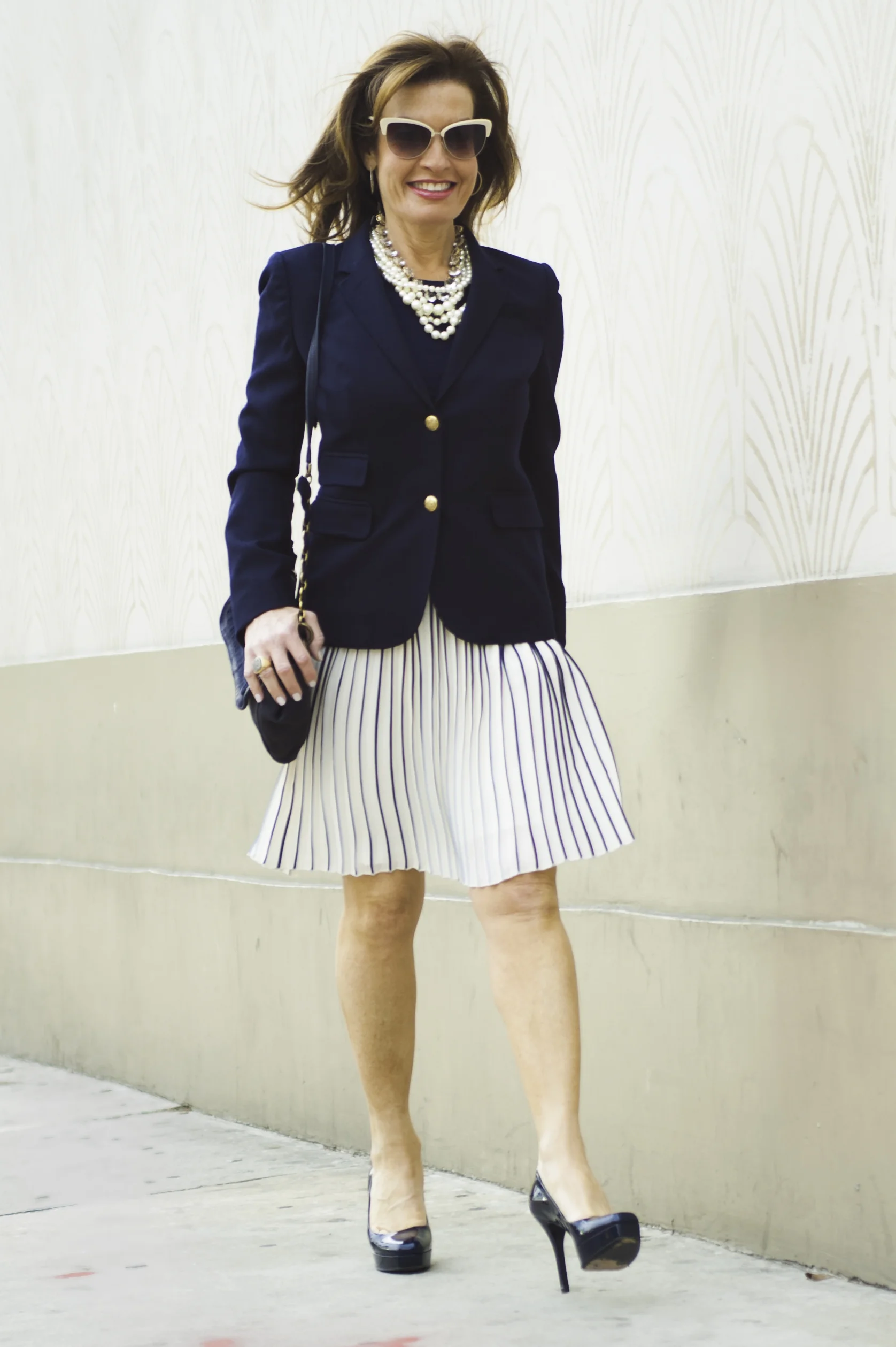Lanvin Handbag, Gucci Pumps, Oliver People’s Sunglasses .