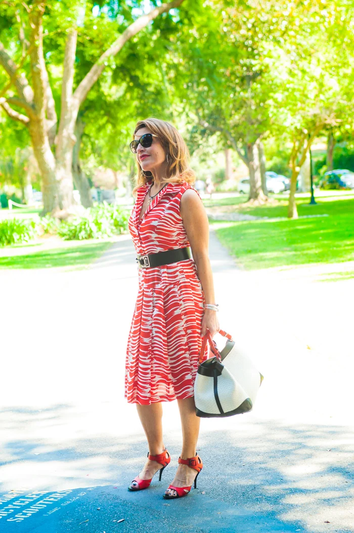 CAbi Dress , Barbara Bui Belt, also seen here , Bottega Veneta Shoes, Caroline De Marchi Handbag, also seen here , Chanel Shades, Sarah Pacini Necklace, John Hardy Bracelet , Spinellikilcollin Ring, available at Savannah Santa Monica , NARS Heat Wave Lipstick.
