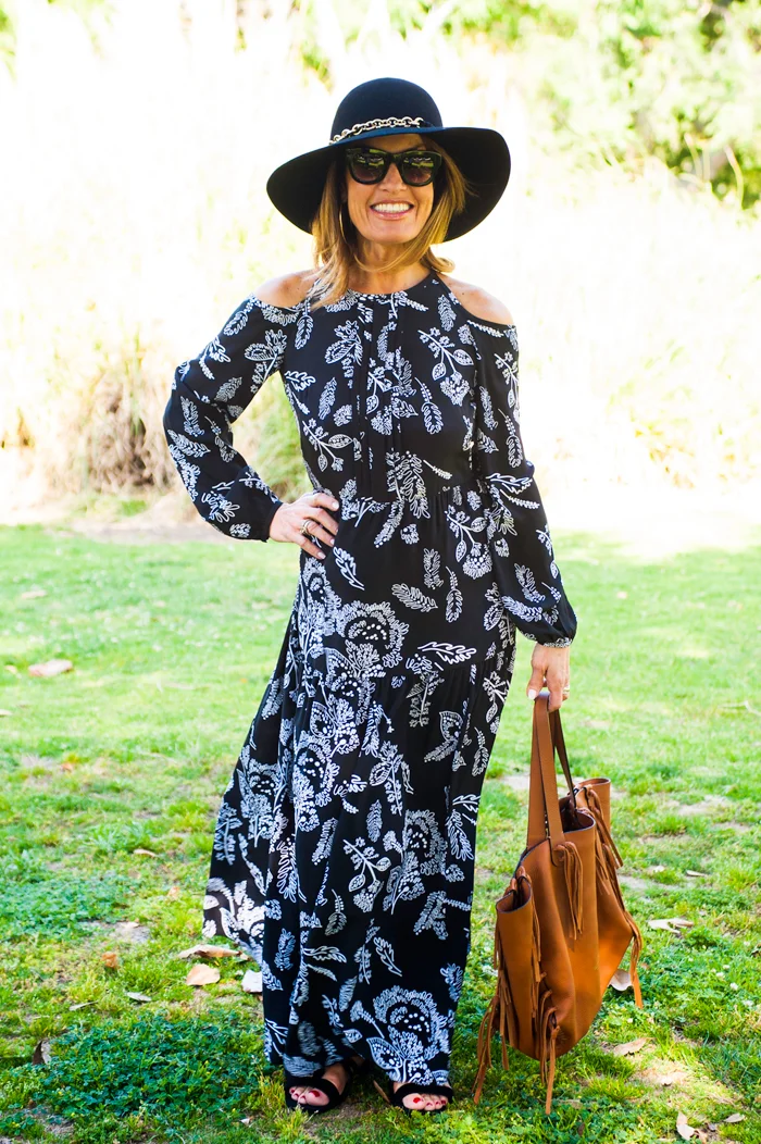 Thakoon Addition Dress , Lanvin Hat, similar here, Valentino Bag, similar here , Celine Sunglasses and Gianvito Rossi Gladiators , Calypso St. Barth Hoops.