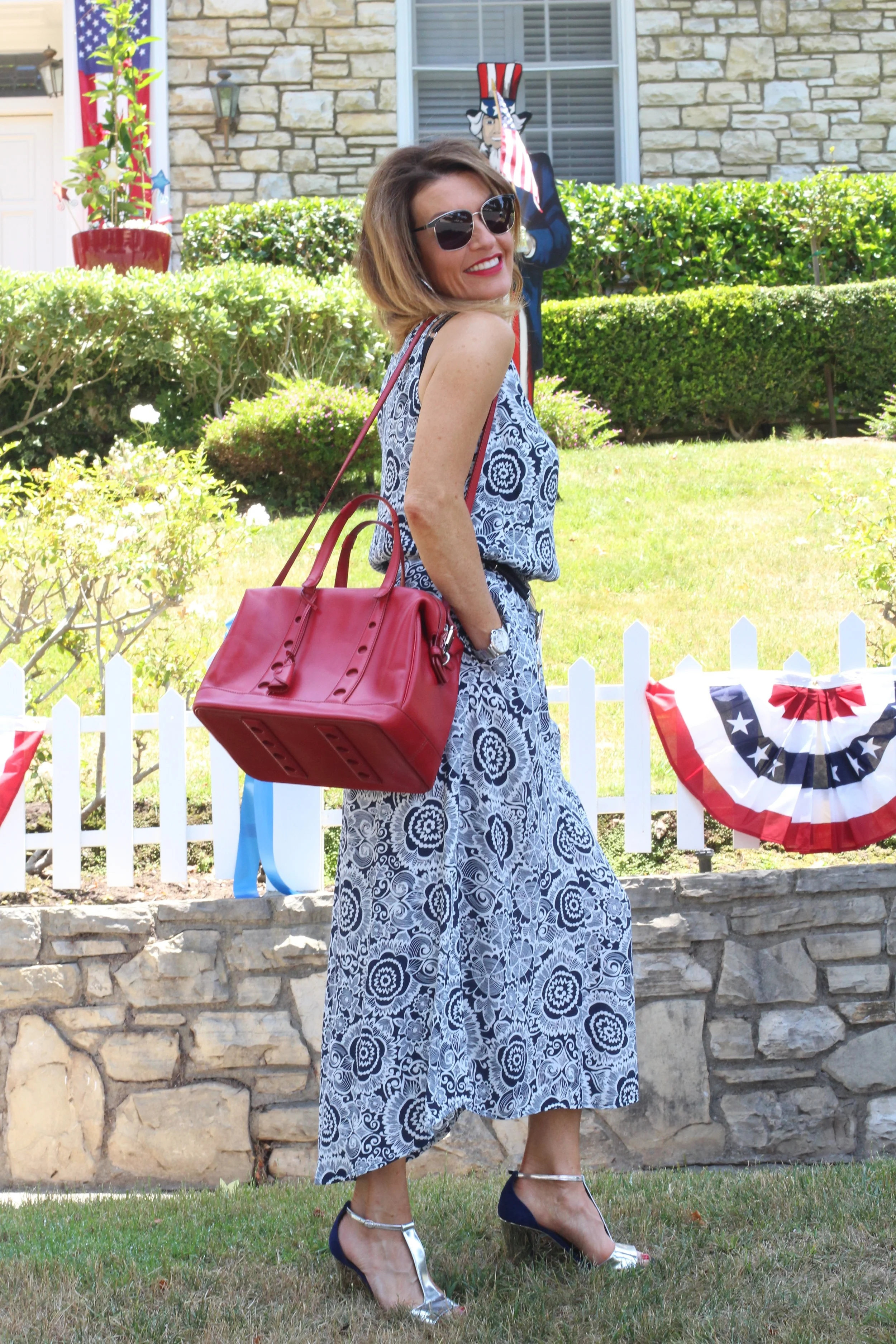 CAbi Twirl Dress, Worth New York Belt, Myriam Schafer Handbag, Rupert Sanderson Sandals, on sale here, John Hardy Earrings and Bracelets, Cartier Watch, Oliver Peoples Sunglasses, Mac Ruby Woo Lip Color, Essie Really Red Nail Polish.&nbsp;