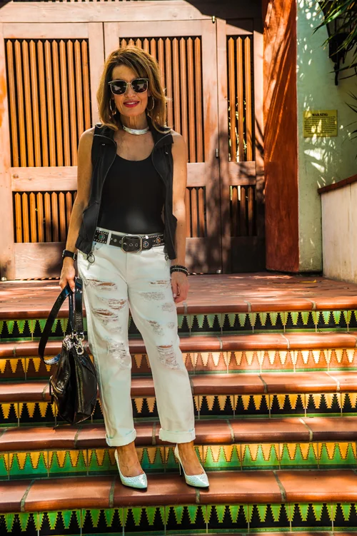 James Perse Tank , Koral Vest and Great China Wall Belt (available at Yellow Dog) Prada Pumps, Citizens of Humanity Jeans, similar for much less here , Givenchy Bag , Caliana Necklace, John Hardy Earrings, also seen here , Zina Ring, Gucci Watch.