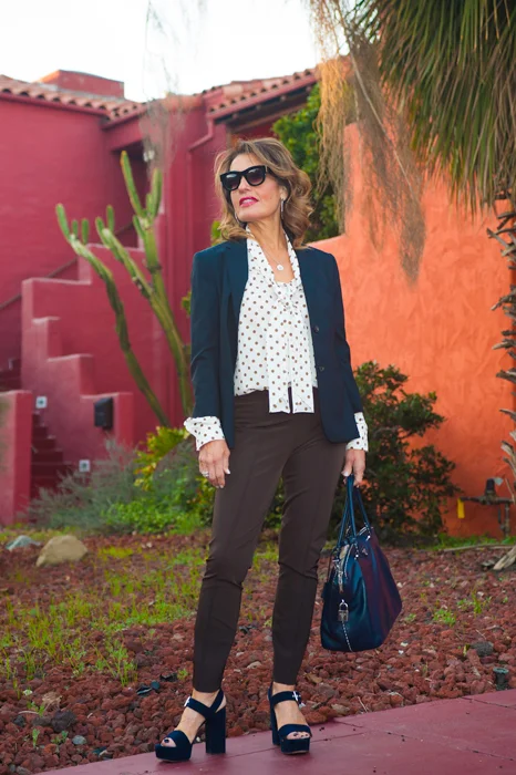 The Row Jacket and Pants, Mantu Blouse, Gianvito Rossi Sandals; all available at Savannah Santa Monica . Prada Bag, Celine Shades.