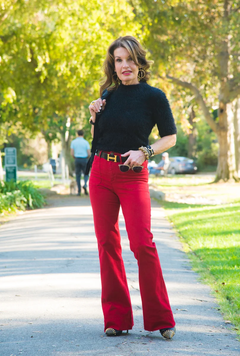 Alice and Olivia Wide Leg Jean on sale here , Aqua Sweater, Gucci Booties, Dior Shades, Henri Bendel Earrings, Ashneil Belt. 