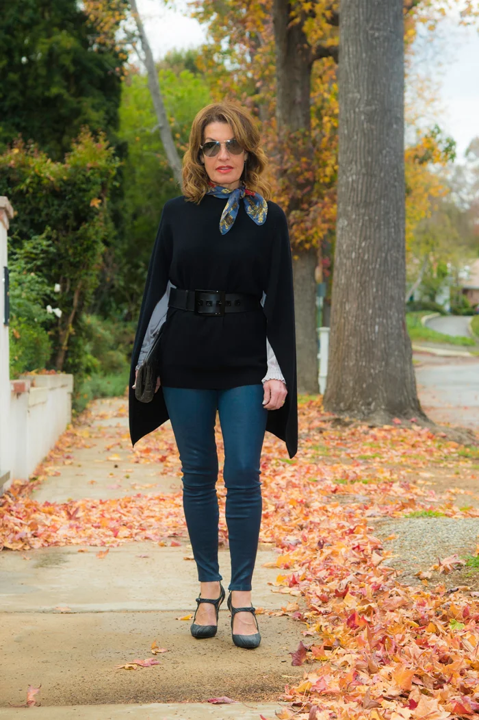 Worth New York Cape (similar here ) and Belt, Ulla Johnson Blouse , Level 99 Leather Pants similar for less here , Stuart Weitzman Shoes, Chanel sunglasses and Clutch, Julie Starr Dresner scarf