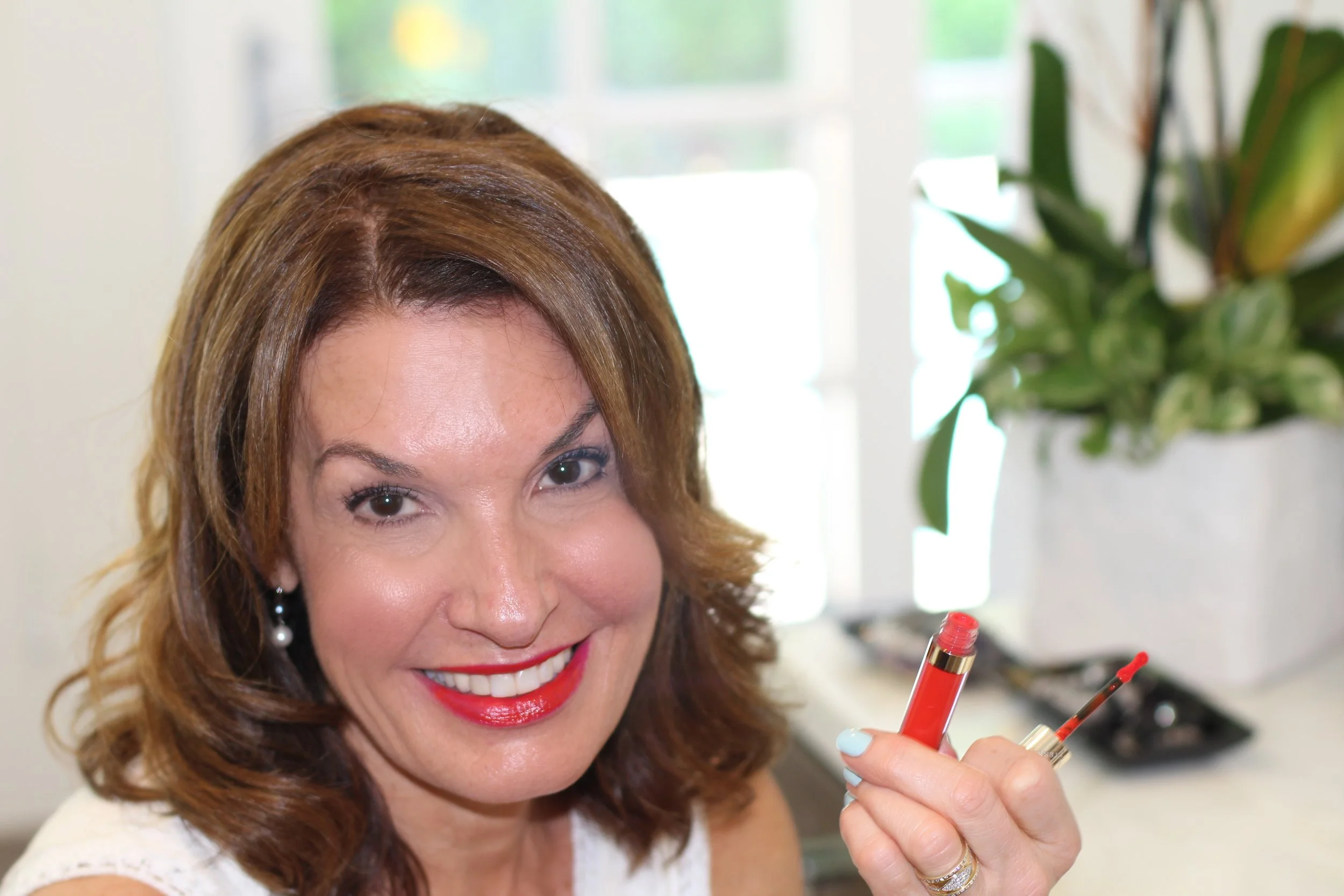 For an added punch of long lasting glossy color, I added this By Terry long wearing lip color/gloss Velvet Rouge #8. 