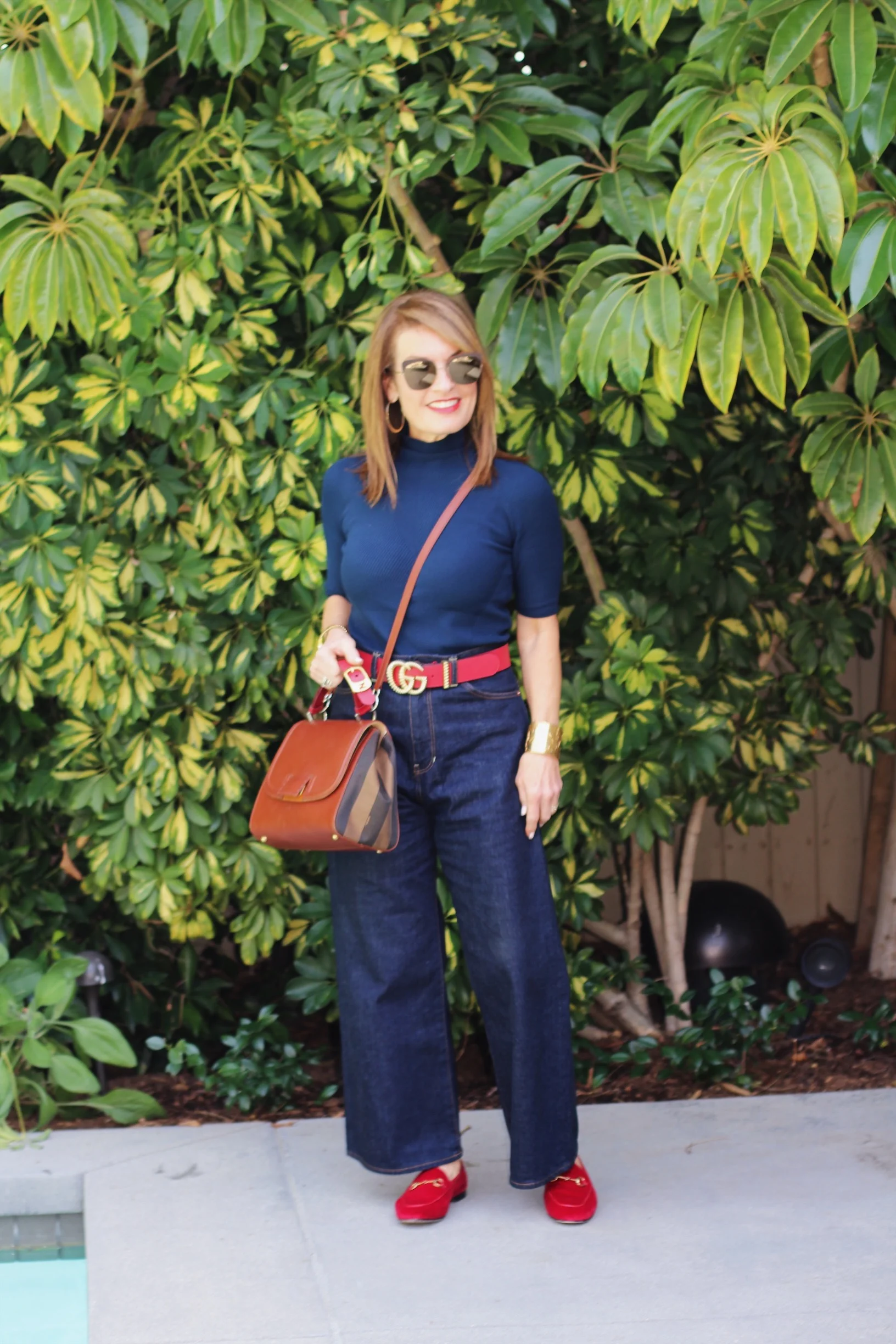 I love a strap that can be worn cross body. Fendi vintage handbag similar here