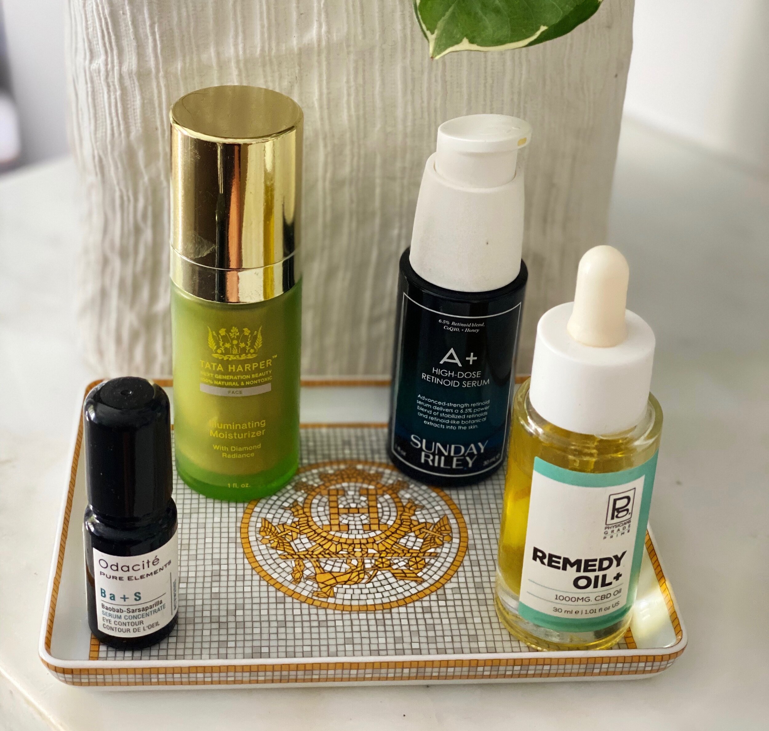 From left to right: Odacité Serum Concentrate Eye Contour, Tata Harper Illuminating Moisturizer,  Sunday Riley A+ High Dose Retinoid Serum, Remedy CBD Oil