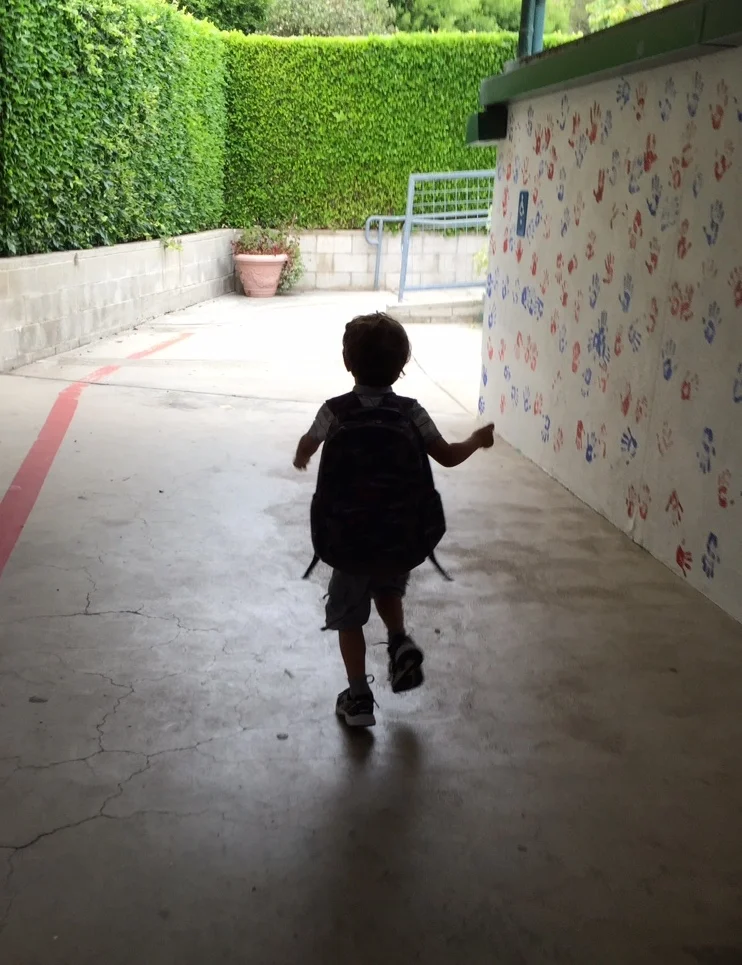 My son running to hisclassroom the next morning, on his first day of Transitional Kindergarten