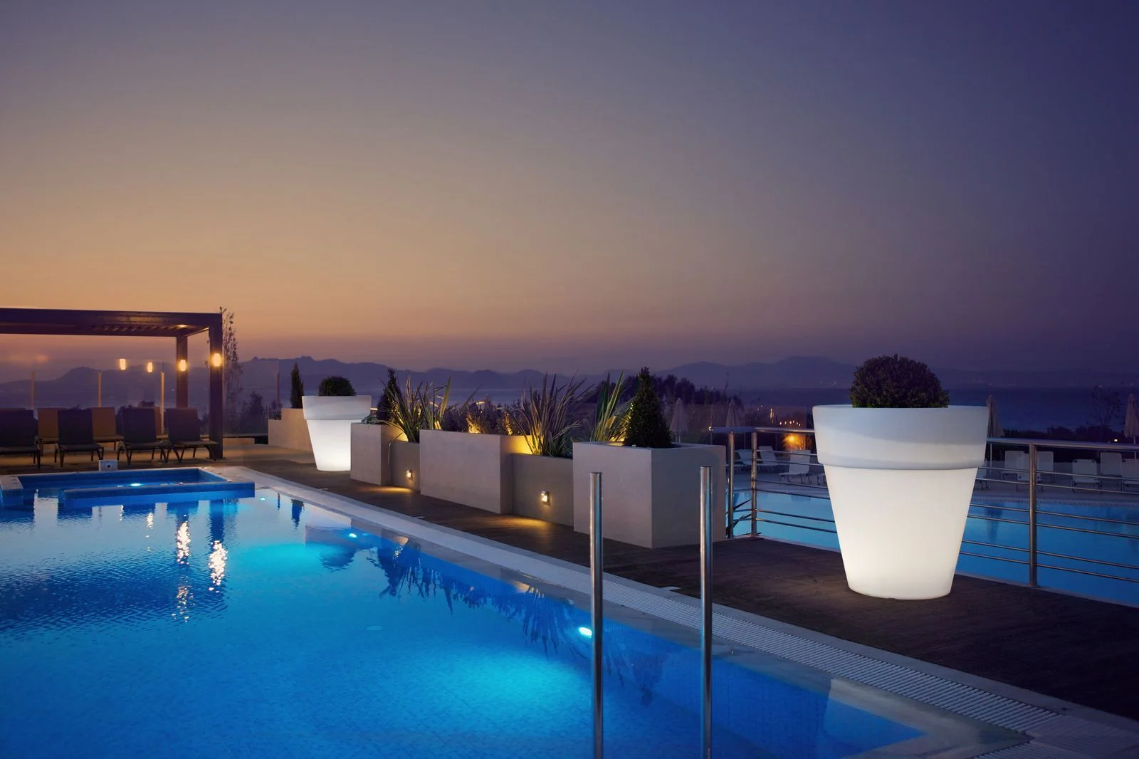 Kipriotis Panorama Suites Hotel in Kos pool by night.jpeg