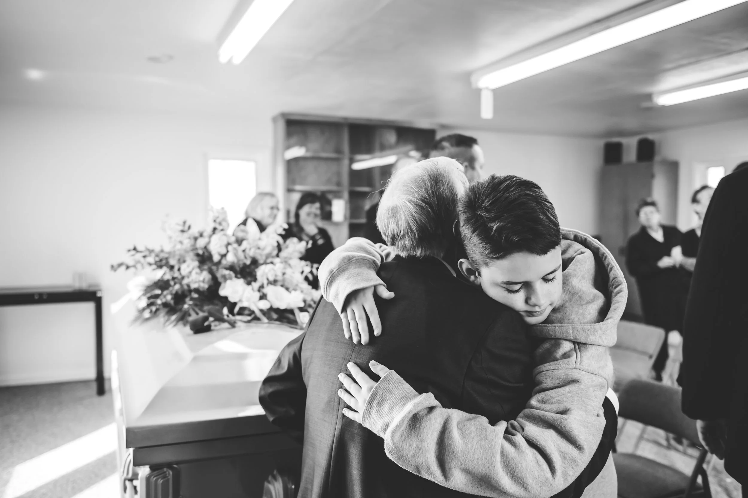 There are few photographic events in life that can capture the tenderness a family shares in their deepest moments of need.