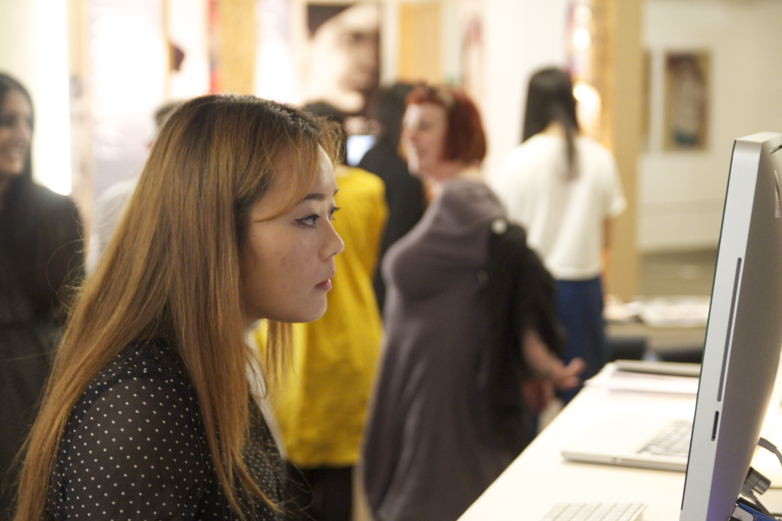 Michelle taking in the sounds of her sensory moodboard