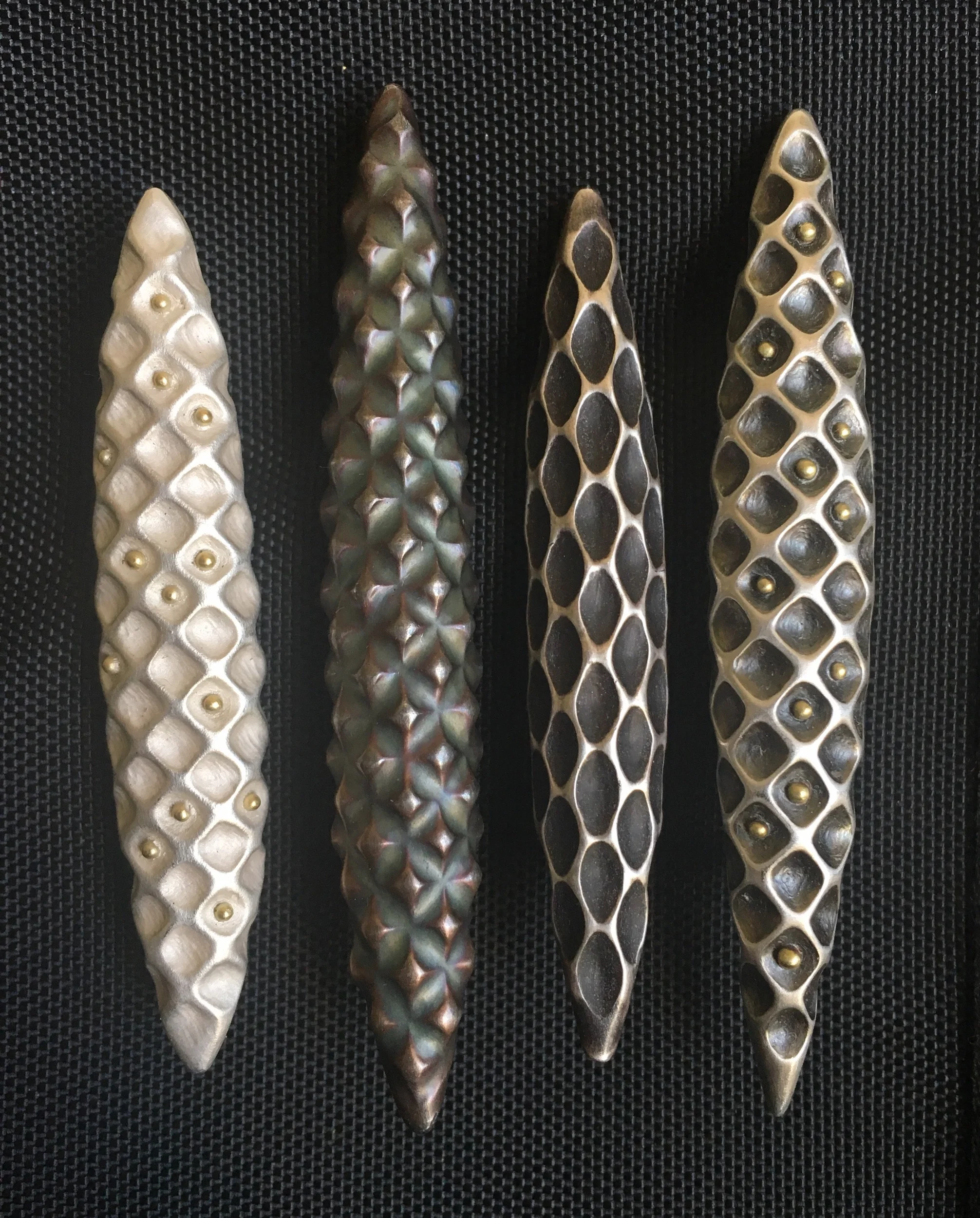 Pod brooches