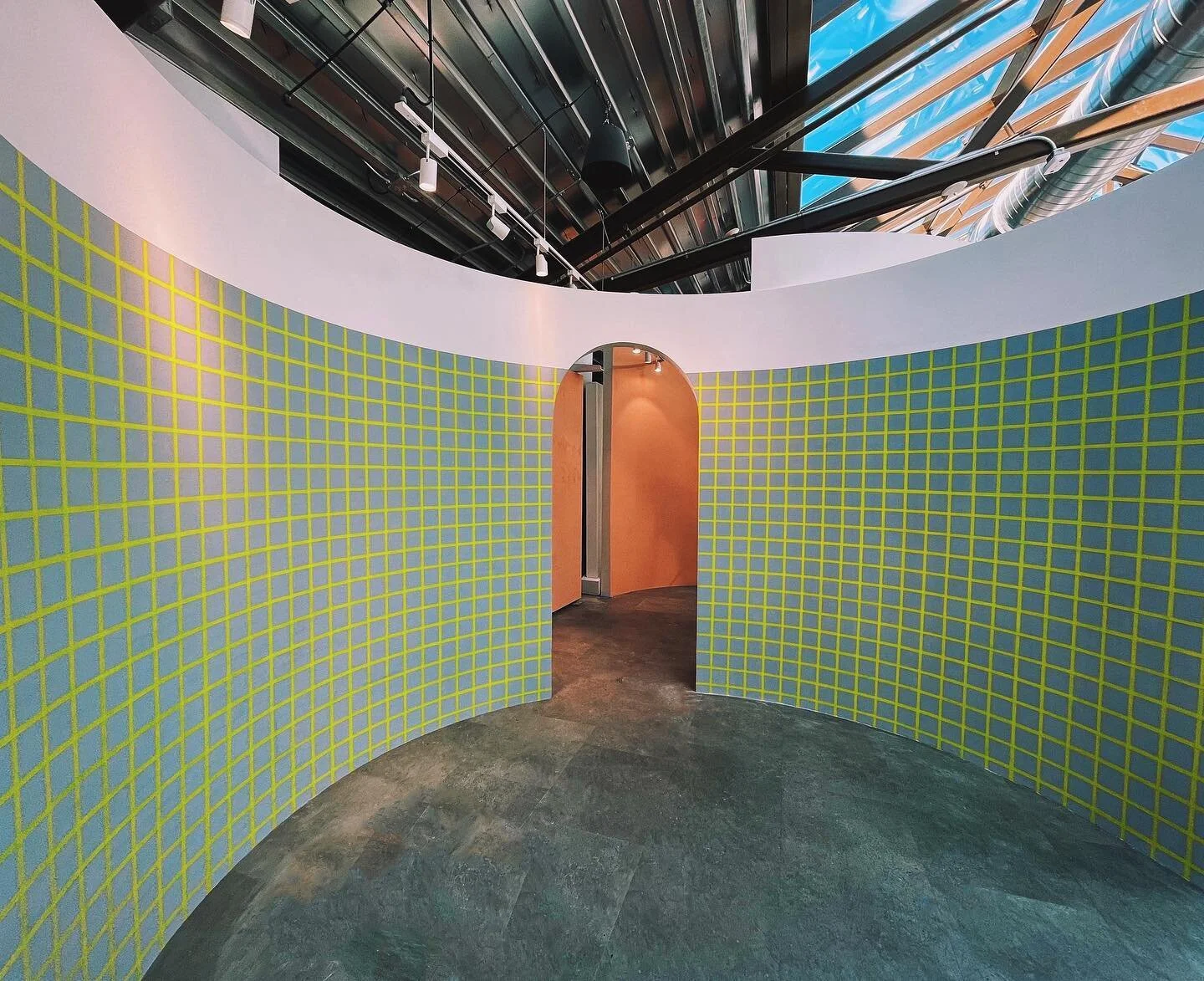 The completed custom art wall painted for the&nbsp;@Watskin&nbsp;collection at&nbsp;@showfields&nbsp;Miami. 🟩⬜️ While the intricate grid pattern took hours (and hours) to paint, the finished art wall pairs perfectly with the Watskin brand. Stay tune