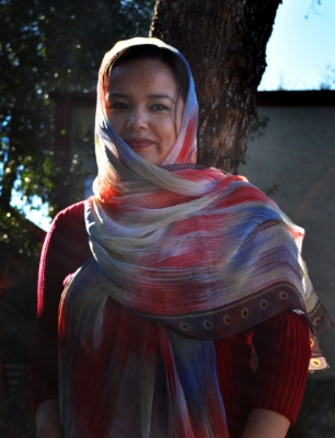 Khatera, a refugee artisan from Afghanistan, that uses her sewing skills to earn an income for her family. (Photo credit to Maggie Wong)