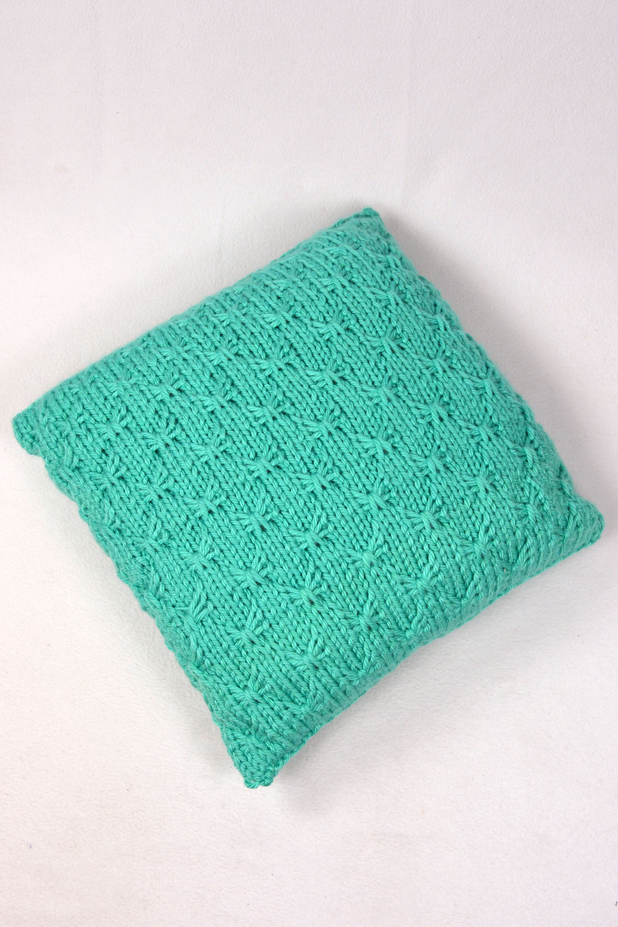 teal pillow.jpg