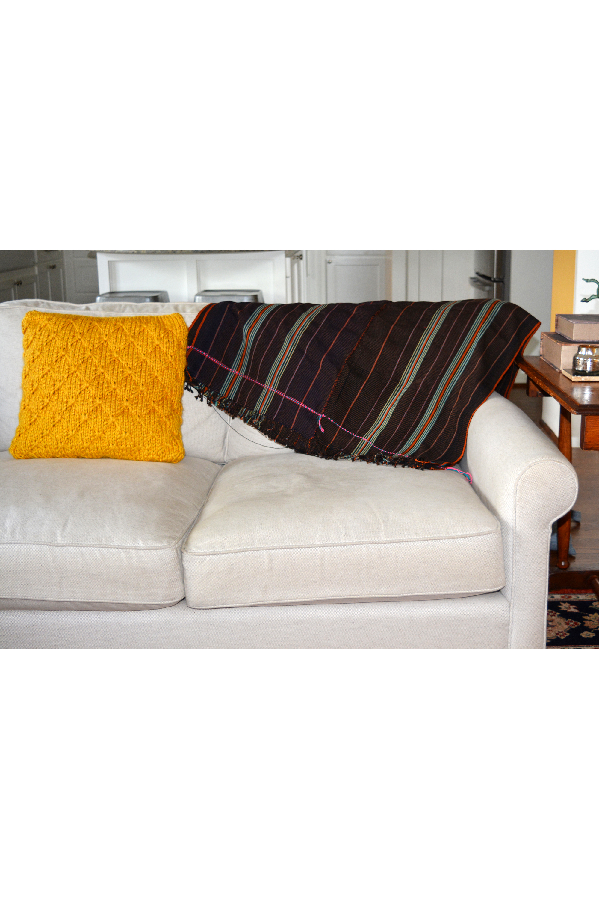 brown beach blanket on couch.jpg