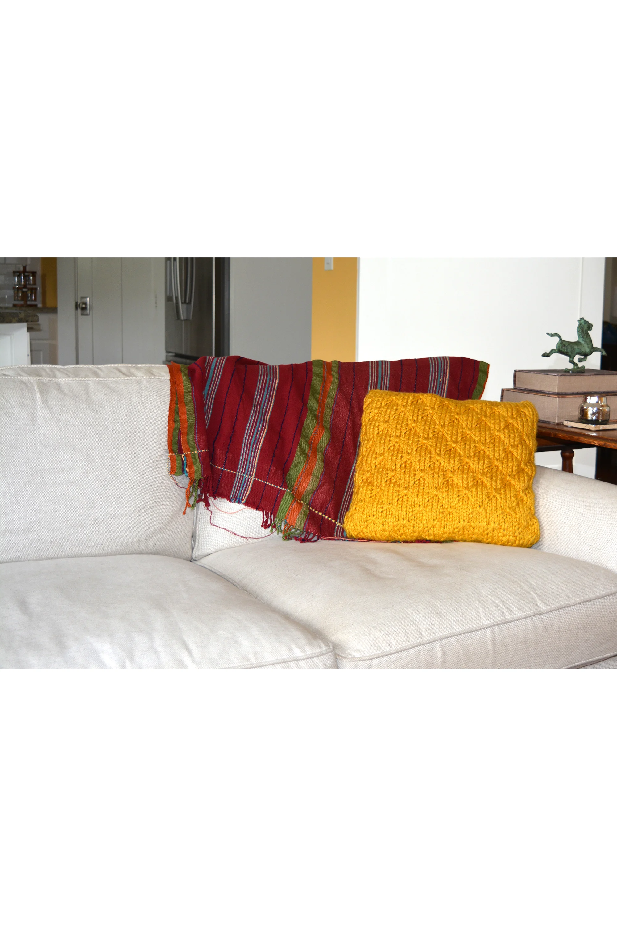 red blanket and yellow pillow on couch.jpg