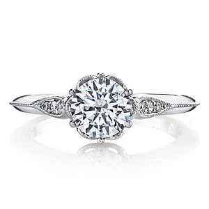 1. A knife-edge band and delicate milgrain beading provides a timeless vintage look.