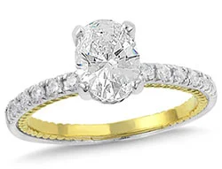 13. A unique twisted rope design and thin diamond band accentuate the oval diamond of your choice.