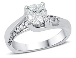 4. Cascading graduating diamonds and a subtle twist make our Intriguing engagement ring beautiful and unique.