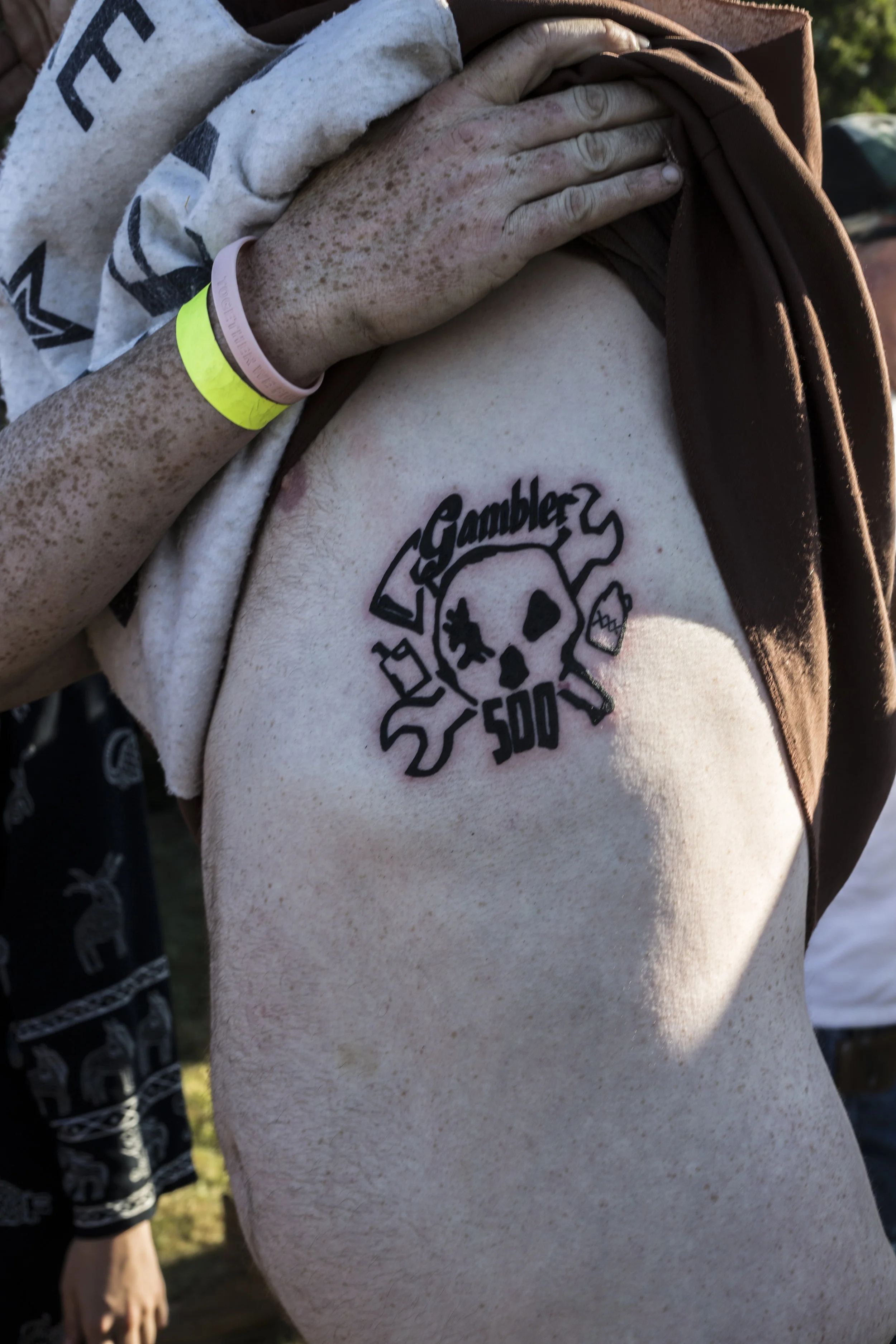 The finished product. Michael Young, just before having to break the news to his wife that he now has a Gambler 500 tattoo. He’s currently still married and breathing… so she must be a really good sport.
