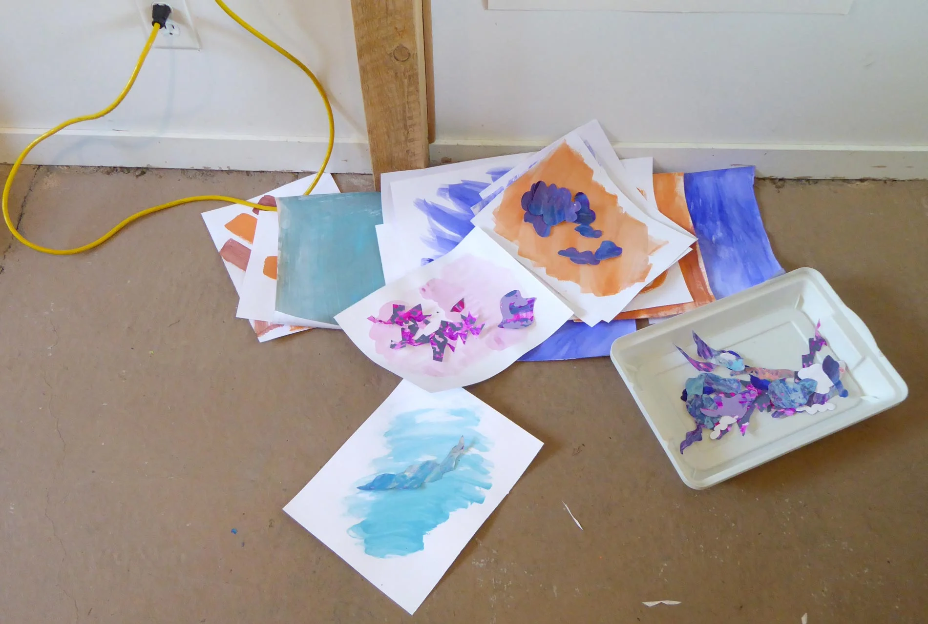 Here's more of those small painted collages in process. I make painted backgrounds and then compose cut up painted pieces on them to create new compositions and vignettes.