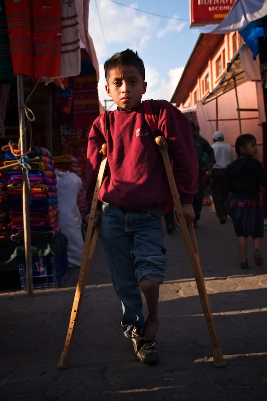 Boy with crutches. Chichicastenango, Guatemala (Copy)