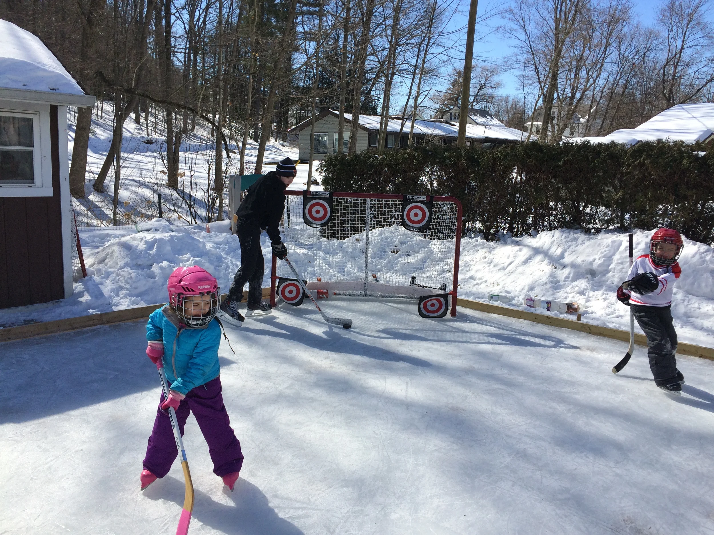 A beautiful day on the ice with the kids and another one of my jr. high players. 