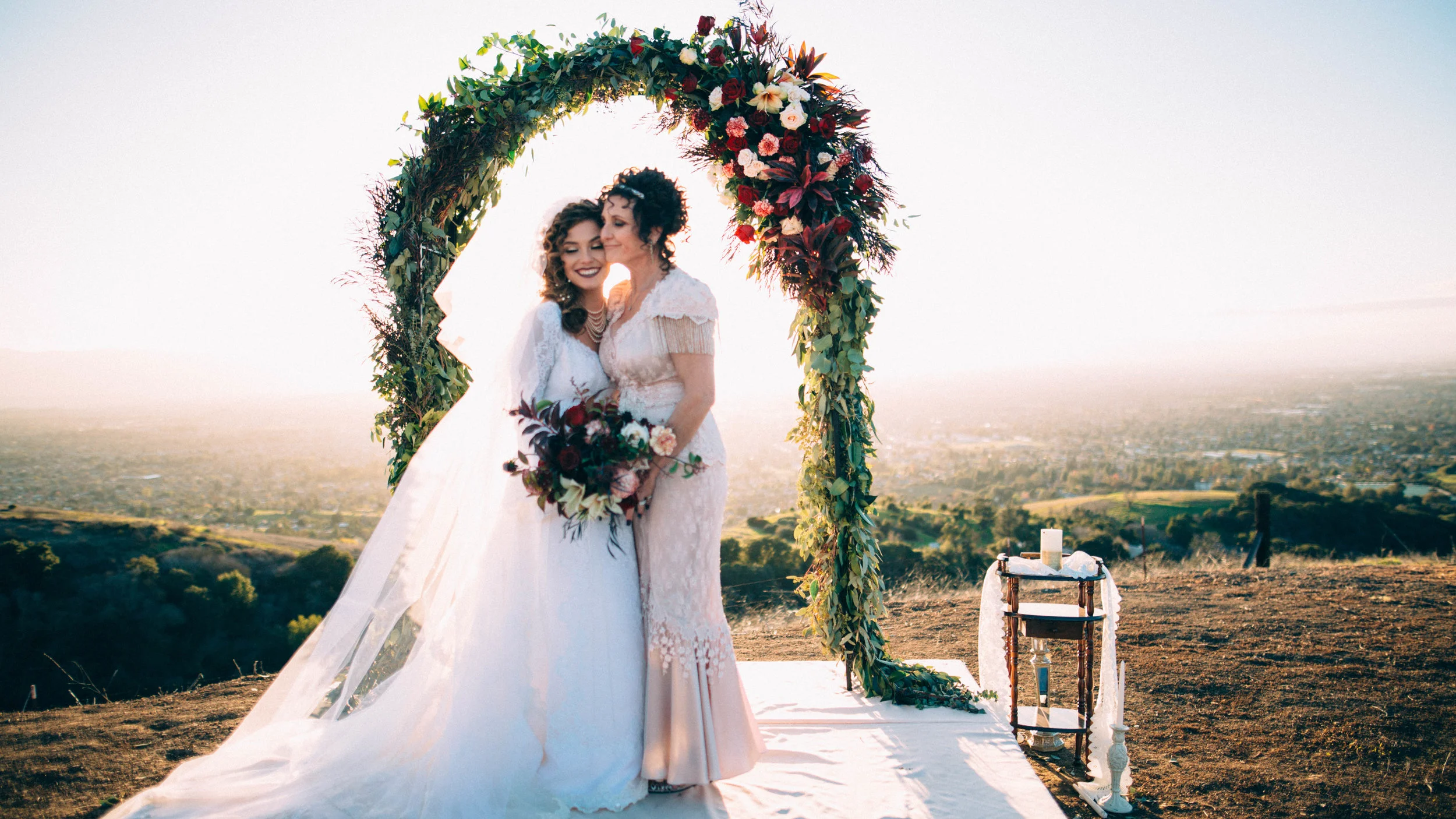 The bride and her mom. And the epic wedding ceremony backdrop and view! 