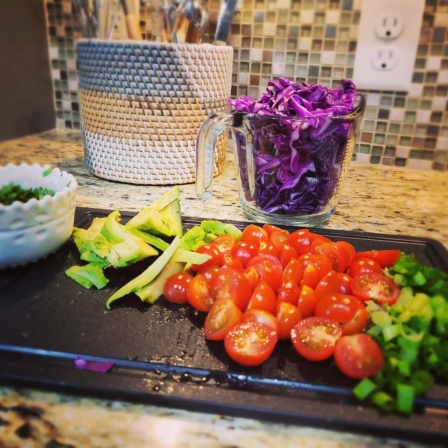 The makings of a taco salad! I love adding so many things to my salads I end up with more veggies than lettuce sometimes! I used a mixture of black beans and barley flavored with some cumin and chili powder instead of meat this time for a vegetarian 