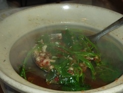 Ant Egg Soup with seasonal local vegetables. You can see all the white eggs over the spoon!