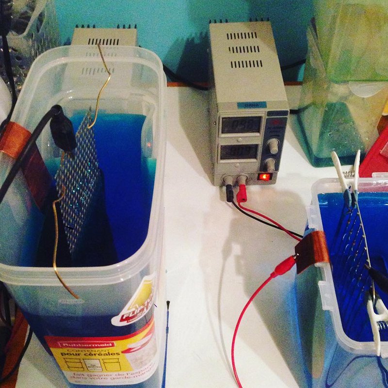 An electrochemical etching station on Dana's studio workbench.