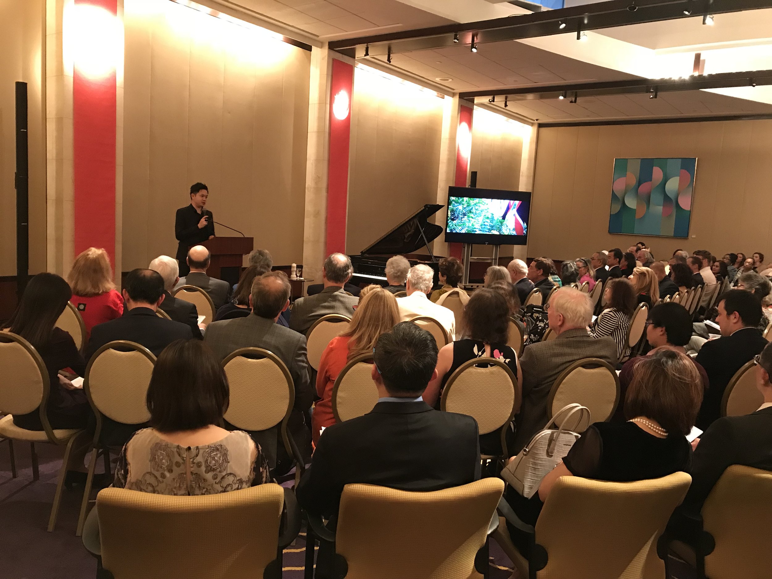 Heegan giving an introduction of his performance.jpg