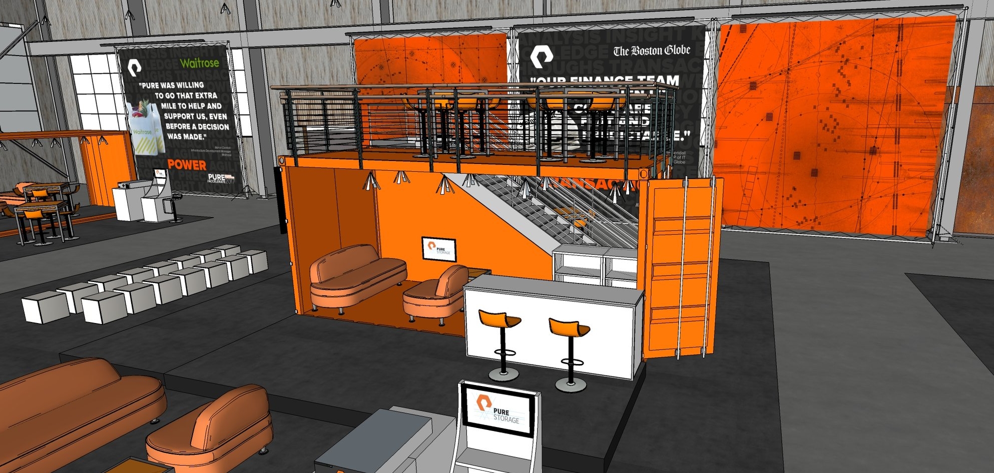 Taking advantage of the spacious interior of the hangar, a "second floor" was added to the top of a 20' crate to act as a lounge space for attendees to meet, discuss, and have a view of the entire expo.
