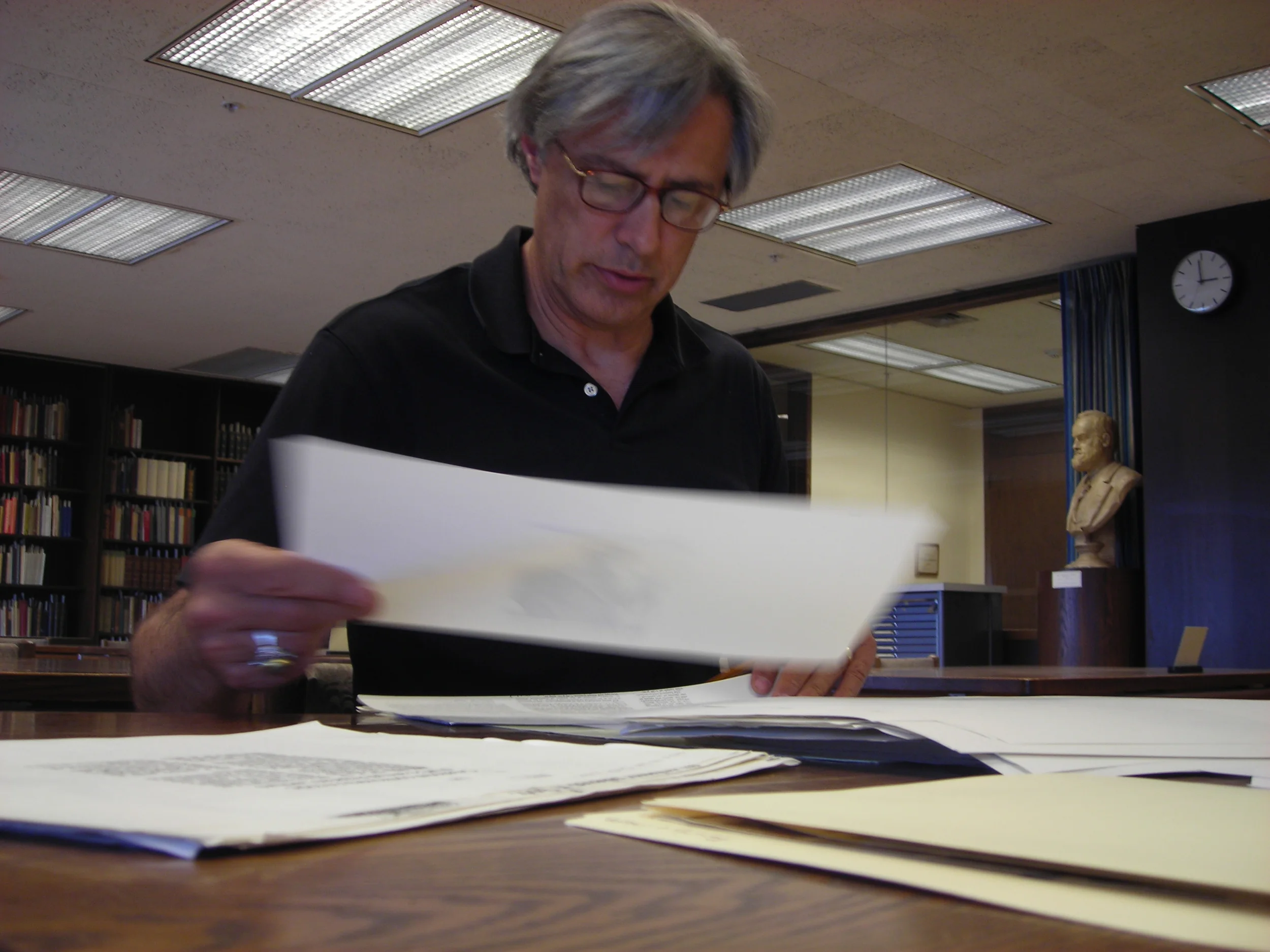 Dana working in the Huston Smith archives at Syracuse University.