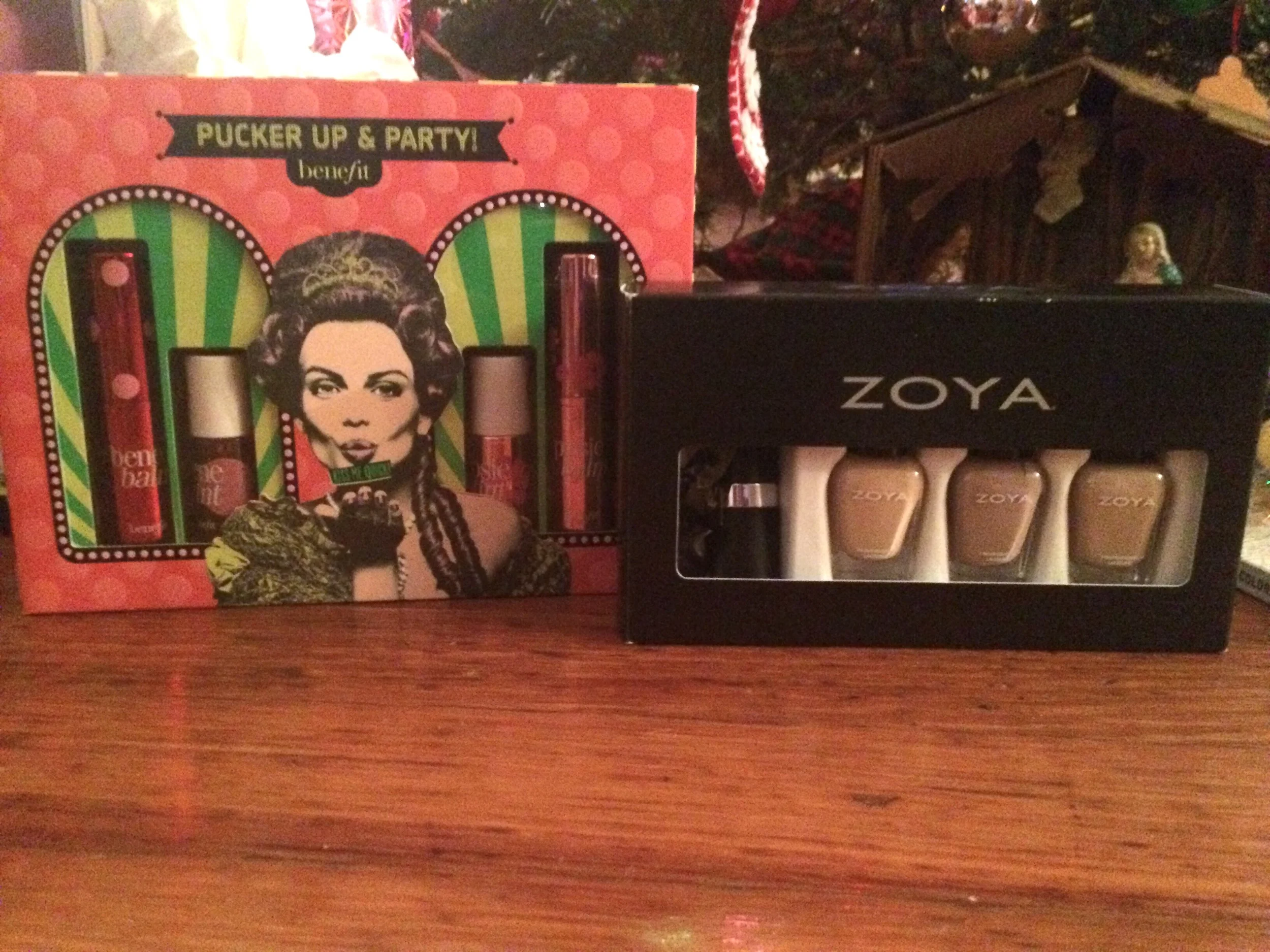 Benefit and Zoya sets from my mom! I'm currently wearing "Rue," the middle shade in the Zoya set, and it's this awesome mauvey griege <3