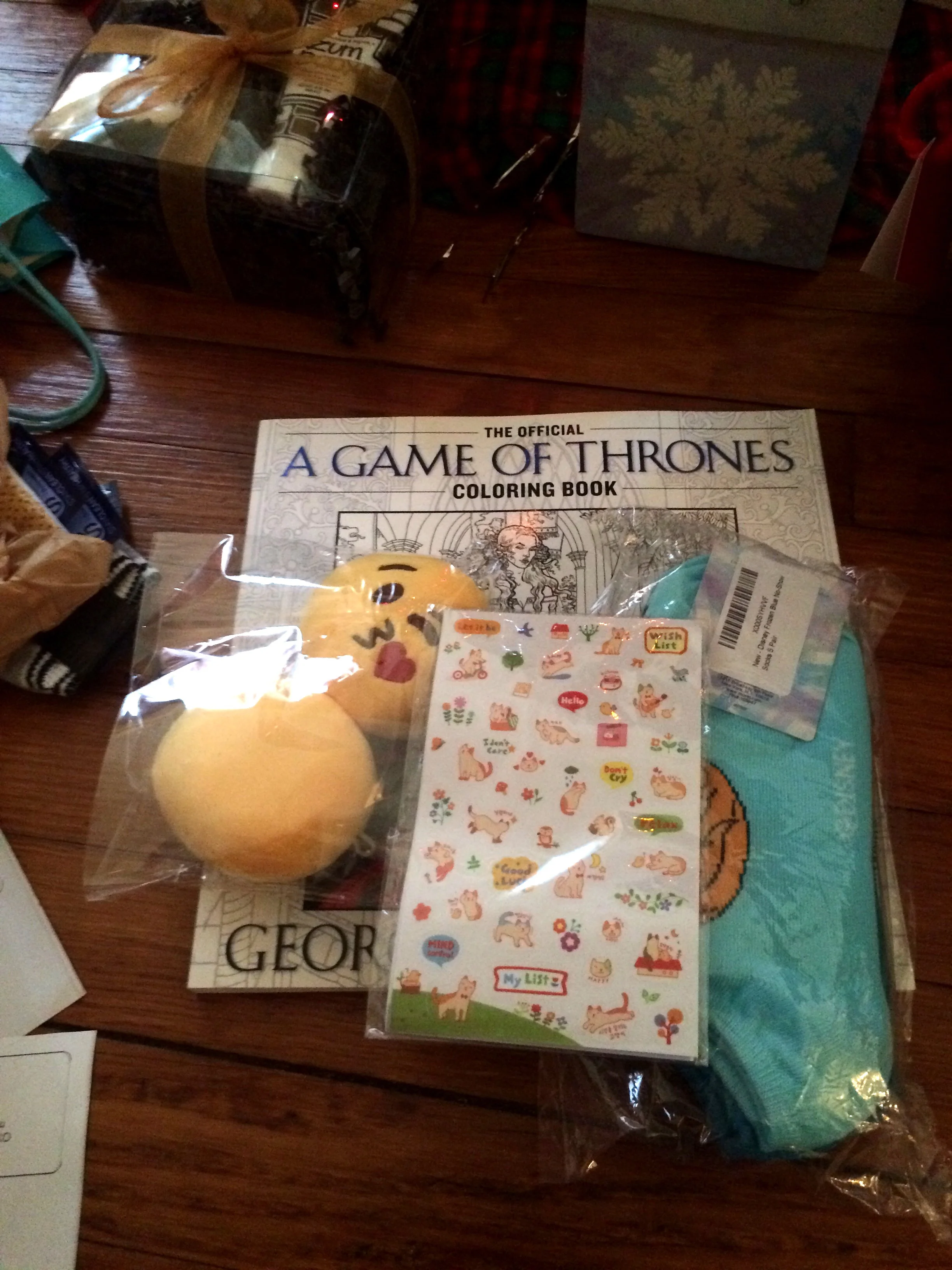 My bffl sent me gifts for my "inner child," haha. Cat stickers, Frozen socks, GoT coloring book, and emoji keychains ftw!
