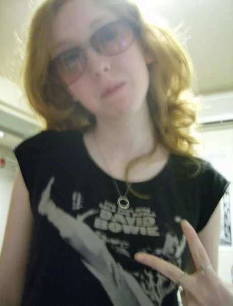 Junior year of college. I found this shirt at the Gap and wore it all the time! This was also my first Blogger profile picture HAHA!