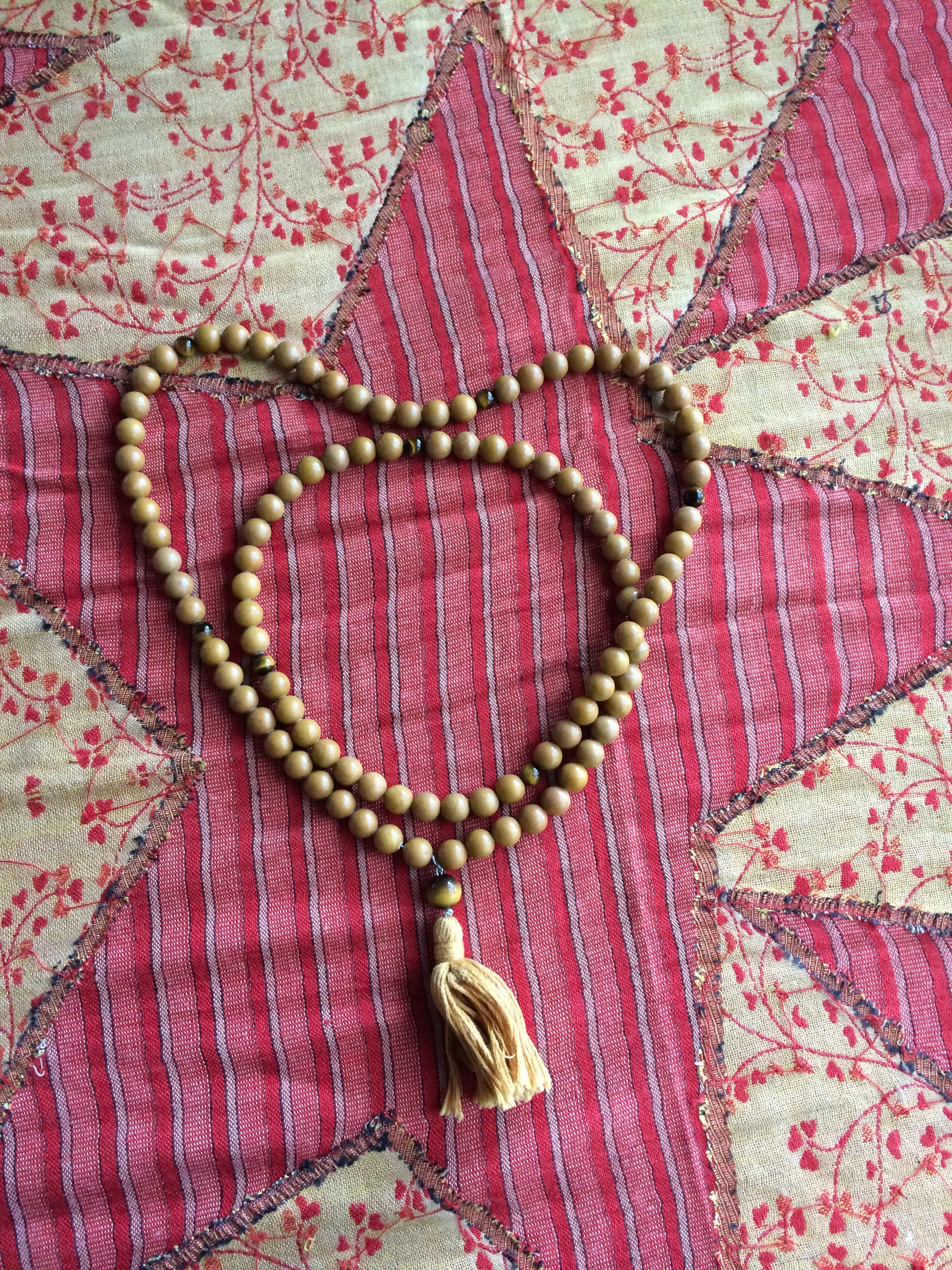 These beautiful japa mala beads are yellow jade and tigers eye - as worn by Buddhist monks - a gift to Min from Rick and Lindy Butler.