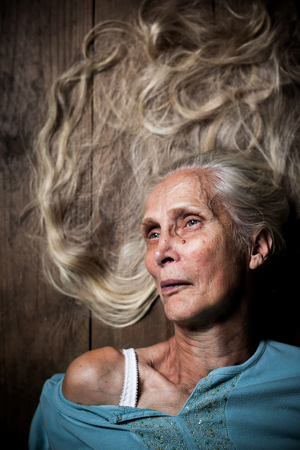 Elderly woman with spread out hair