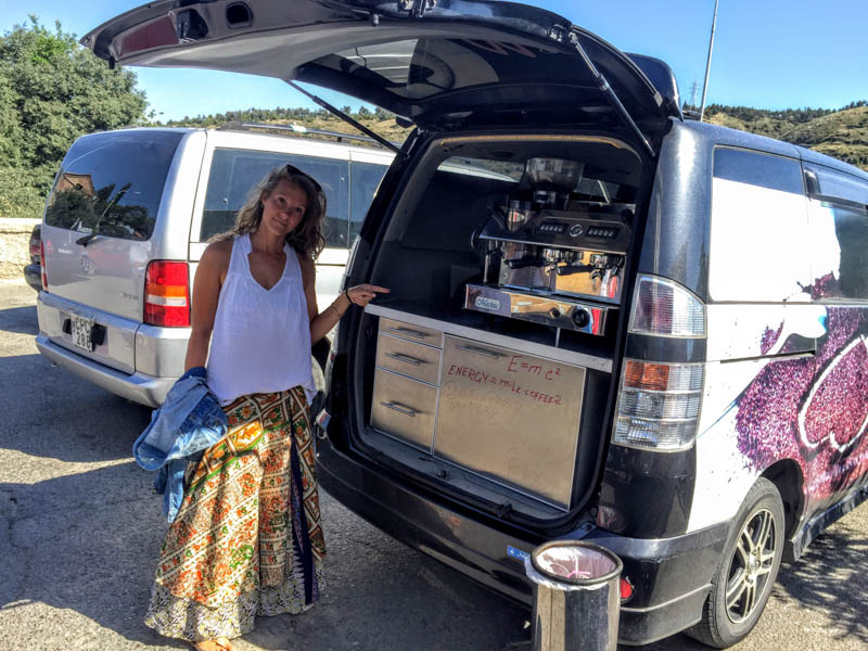 Melody showing us her ideal car interior... one big coffee machine.