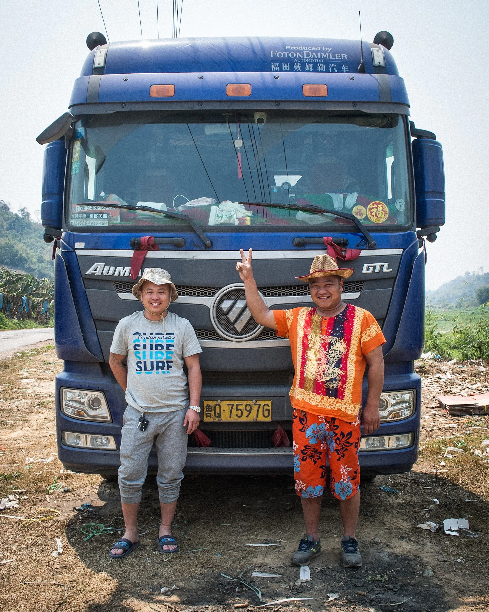 81. Chinese truck drivers loading up some watermelons 