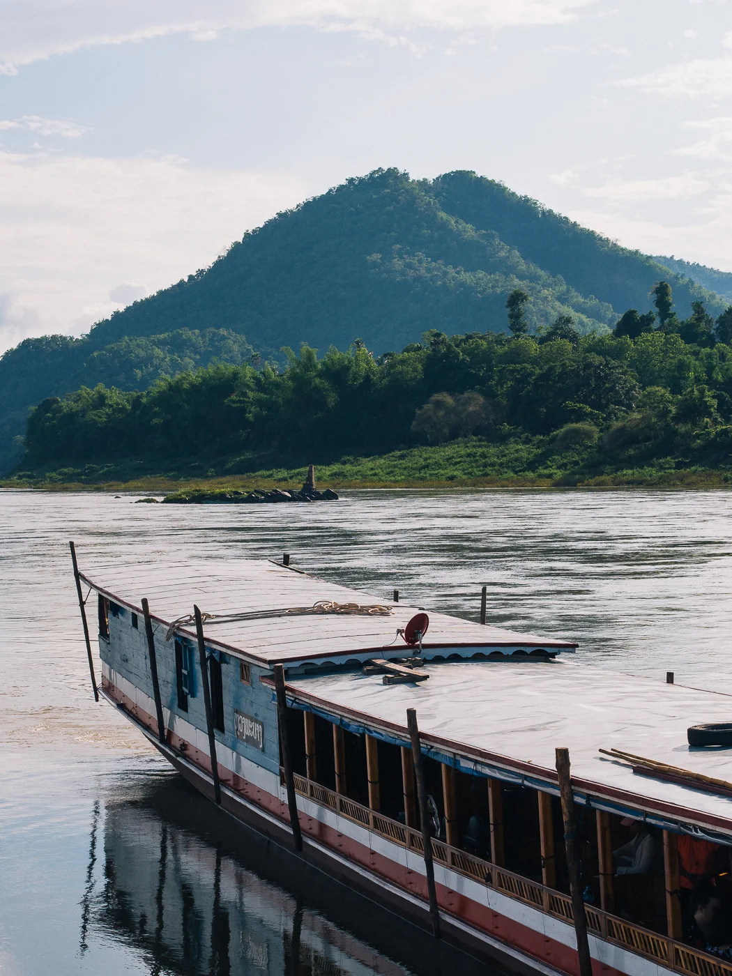 135. Mountains, rivers and boats. All can be found in Laos.