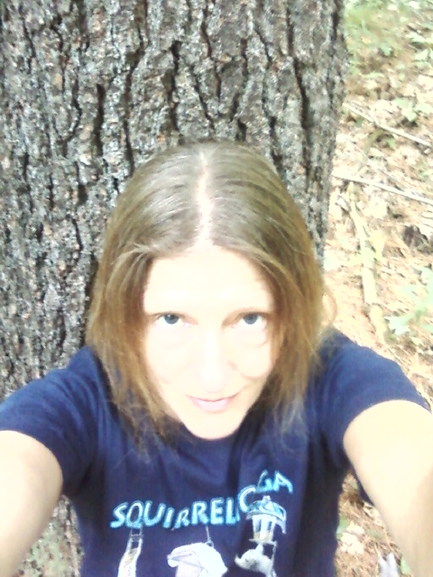 Here I am, getting a "life force" infusion from the same favored white pine! I often sit here, my spine hugging this white pine, contemplating life.