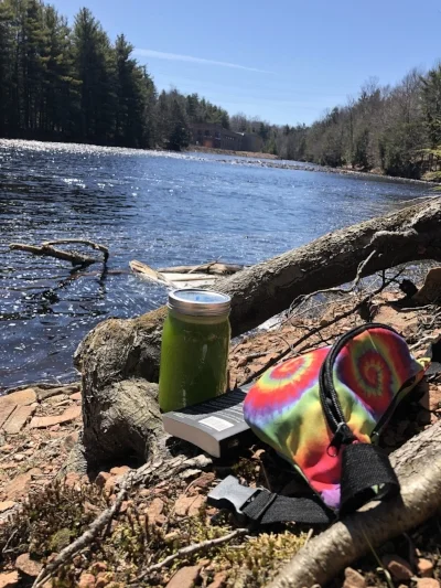 Relaxing by the Raquette, reading a book sipping my Cilantro Lemon Aid, and deeply grateful for the Sunshine of Spring!