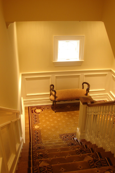 cove-neck-staircase-wainscoted.jpg